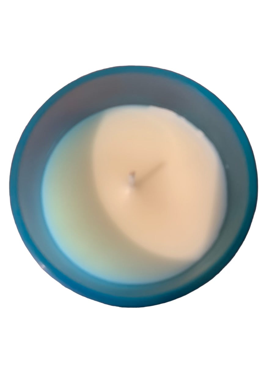 Experience the invigorating scent of the ocean with our 14oz Ocean Fragrance Soy Blend Candle. Our premium soy blend wax burns cleaner and longer, providing a 100% natural alternative to traditional paraffin wax candles. With a burn time of up to 50 hours, you can enjoy the fresh and calming aroma of the ocean for longer.
